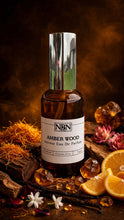 Load image into Gallery viewer, Amber Wood Intense Eau De Parfum

